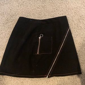 BDG: Black with orange threading zippered skirt . Size SMALL.